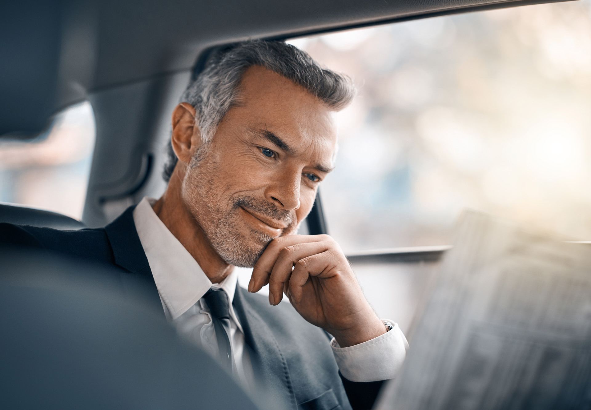 reading paper in car